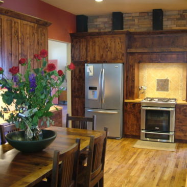custom kitchen remodel wood counters wood cabinets wood floor stainless appliances custom tile